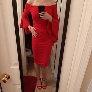 Bright red cocktail dress with dramatic sleeves